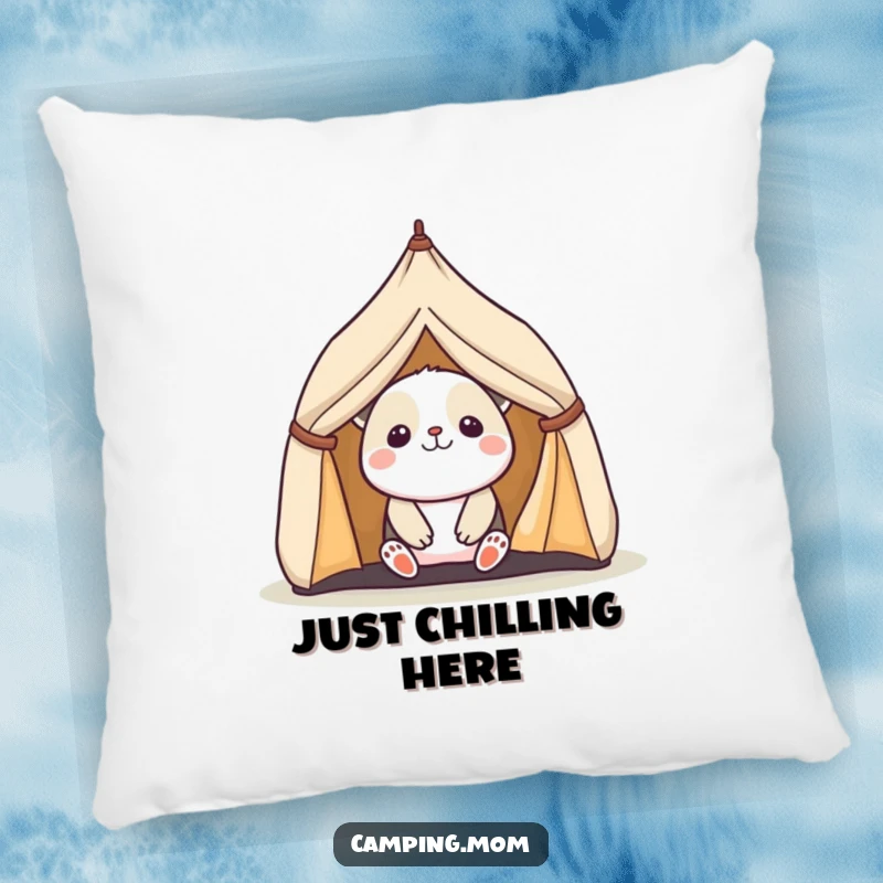 Funny pillow with a kawaii camping animal peeking out of a miniature tent, offering a delightful and cozy decorative accent.