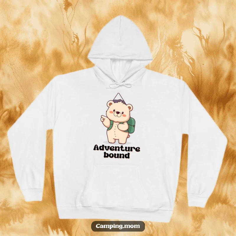 Funny hoodie showcasing a fluffy mama bear with a backpack, excitedly gesturing towards a distant mountain peak, embodying adventure.