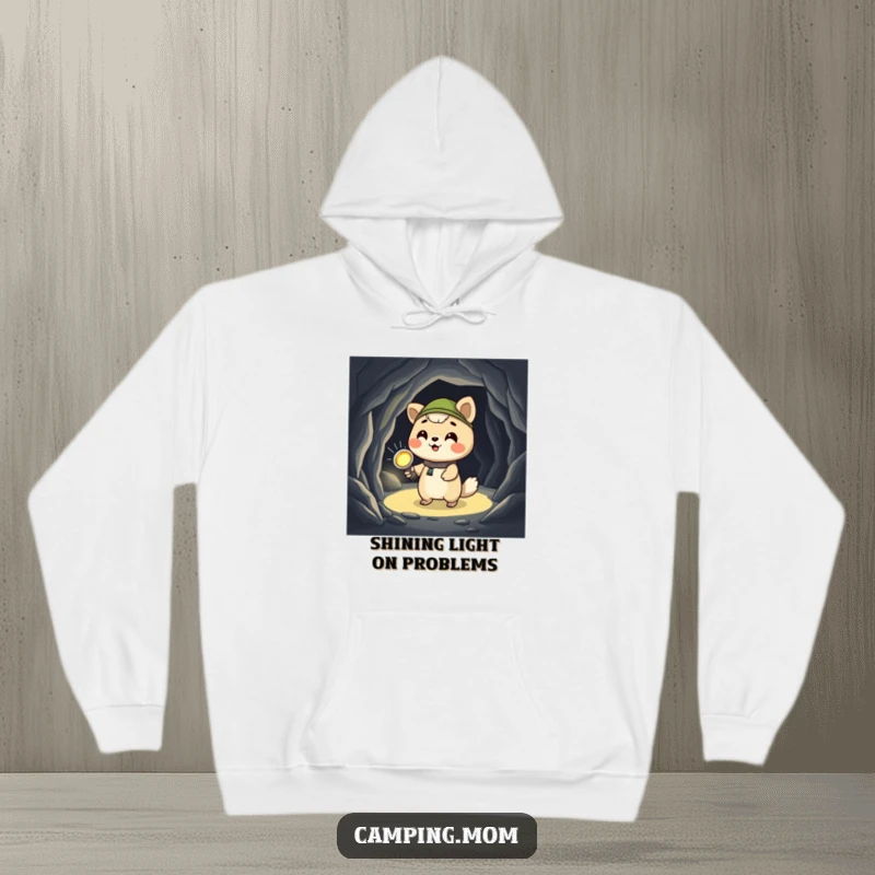 Funny camping animal hoodie, giggling while holding a flashlight in a dark cave, offering warmth and a touch of mysterious humor.