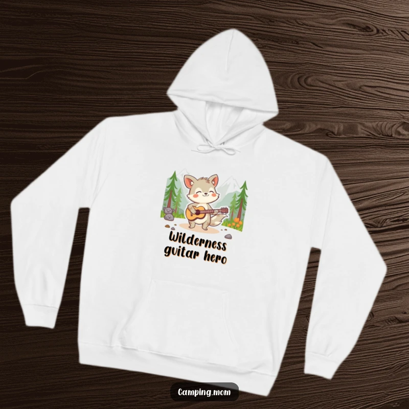 Funny animal character intensely playing a guitar in a wilderness setting, looking spirited and cool, featured on a warm hoodie.