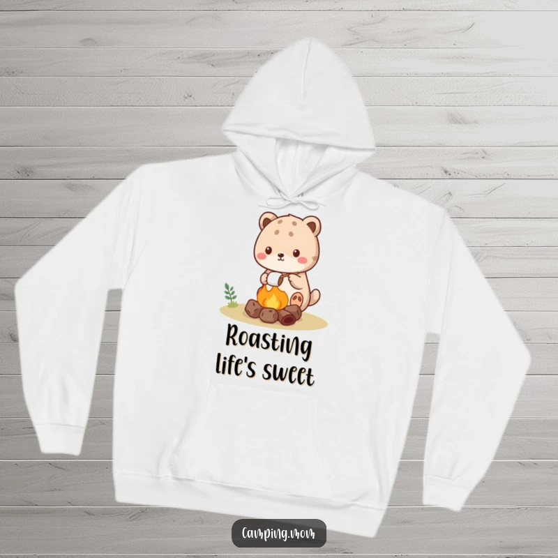 Funny kawaii camping animal hoodie showing a cute creature roasting a marshmallow over a tiny campfire.