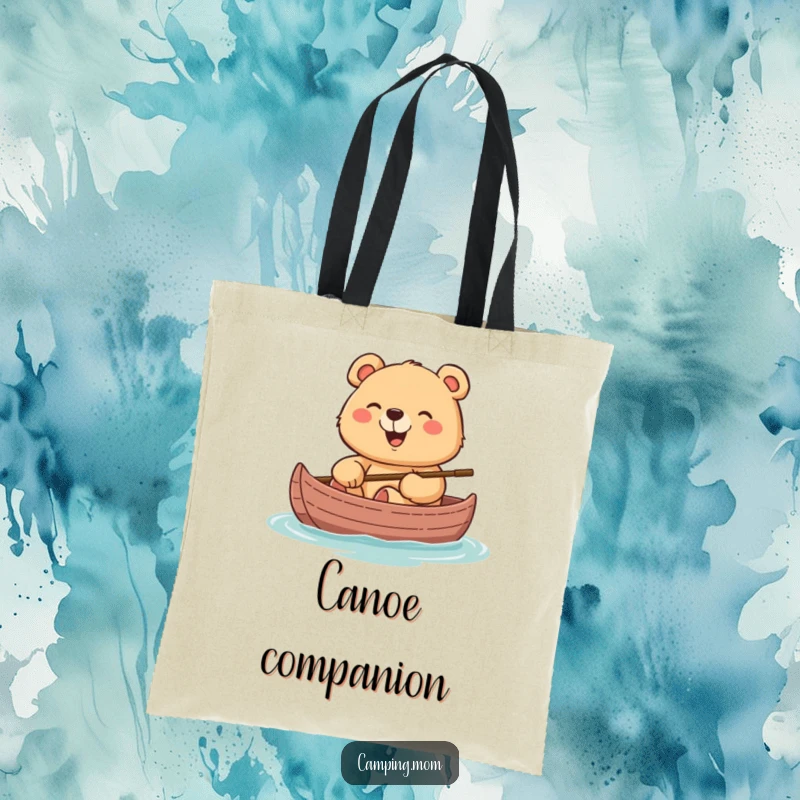 Funny tote bag with a cheerful mama bear giggling while sitting in a canoe, ready for aquatic fun.
