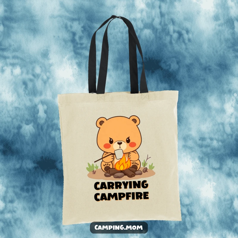 Funny tote bag with a determined mama bear roasting a marshmallow over a campfire, ready for delicious treats.